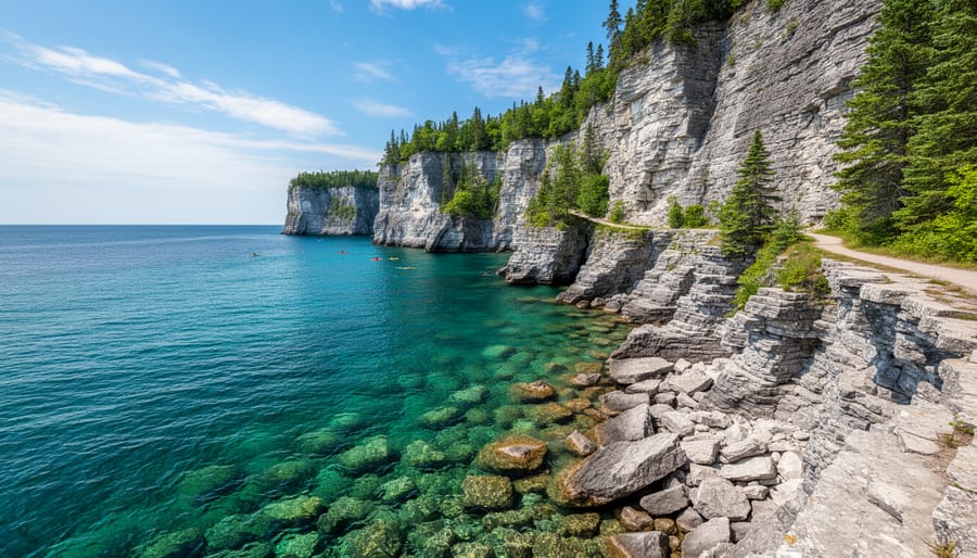 View of rugged cliffs and turquoise Georgian Bay waters at Bruce Peninsula with the Grotto rocks in the scene